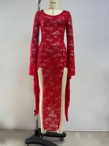 Detail of red floral lace fabric and high side slit on the long sleeve maxi dress