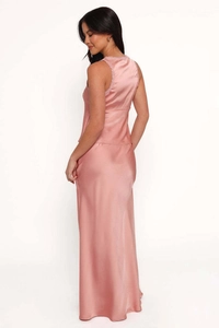 Detail of elegant rose pink silk dress with delicate lace V-neckline and backless design