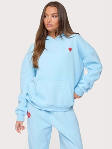 Women's light blue hoodie and jogger tracksuit with red heart logo print streetwear