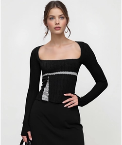 Detail of square neck T-shirt featuring silver chain trim and delicate lace stitching