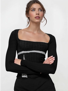 Close-up of square neck detail with lace trim and ribbed texture on black slim fit top