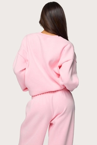 Detailed back view of pink two-piece fleece tracksuit set with hoodie and joggers