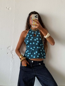 Elegant halter neck polka dot sleeveless top in dark blue with chic asymmetric hemline