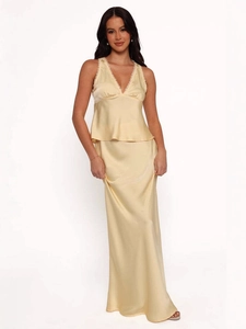 Elegant two-piece light yellow satin set with lace trim crop top and a long maxi skirt