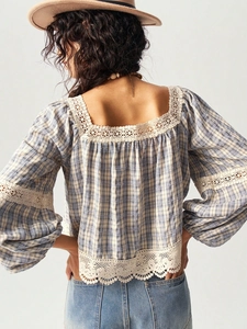 Bohemian blue plaid top with square neck and white lace panels shown from back