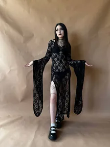 Close-up detail of gothic black floral lace dress with dramatic oversized flared sleeves