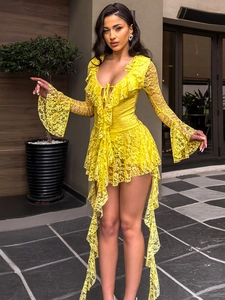 Detail of the plunging V-neckline with ruffle trim and lace ties on the yellow dress