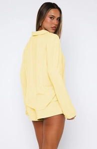 Detail view of the soft light yellow long-sleeve pajama set with breathable cotton fabric