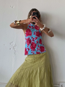 Elegant floral halter top with asymmetrical hem and green maxi skirt set for summer