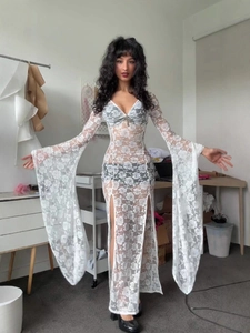 White lace slim-fit maxi dress featuring a deep V-neck, flared sleeves and high side slit