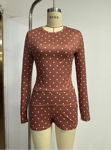 Polka dot loungewear set with round neck long sleeve top and slim fit shorts