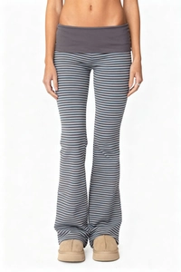 Detail of high waist striped flare pants with grey contrast stitching and Y2K vintage style