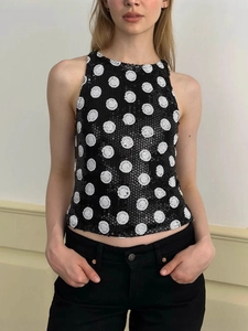 Sleeveless halter top for women featuring sparkling sequins and white polka dots pattern