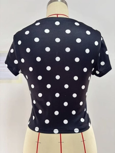 Detailed back view of a slim-fit black short-sleeved T-shirt with white polka dots