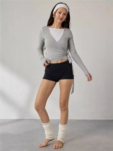 Women's balletcore wrap top in grey with long sleeves, thumbholes and side tie closure