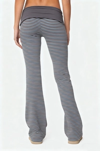 Detailed back view of high-waisted flared yoga pants with blue and grey stripes
