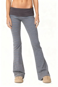 Close-up of high-waist striped flare pants with elastic waistband and slim fit design