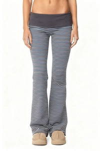 Detailed close-up of grey-blue striped flared pants with a wide fold-over waistband