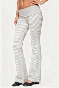 Detail view of high-waist striped flared yoga pants showing fabric texture and gray waistband
