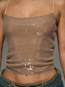 Detail of champagne sequin crop top with thin straps for club and party wear