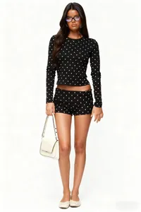 Detailed close-up of fashion polka dot print long sleeve top and shorts lounge set