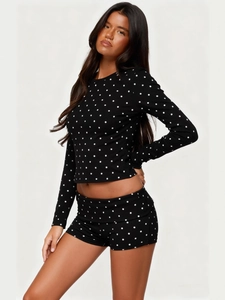 Women's chic black polka dot loungewear set with slim fit long sleeve top and shorts