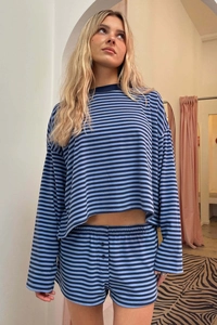Detailed macro view of the blue striped knit texture and waistband on loungewear set