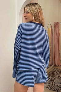 Detail view of striped long sleeve top and matching shorts in soft knit casual loungewear