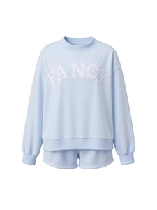 Women's light blue loungewear set with round neck sweatshirt and shorts featuring FANCY text