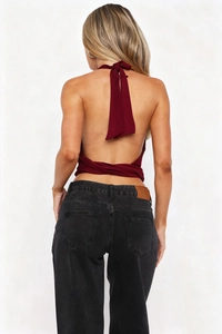 Detailed back view of a slim-fit backless halter top with cross-tie design in wine red