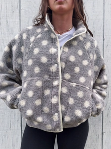 Women's grey fleece jacket with white polka dots, stand collar, and snap buttons