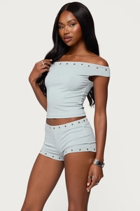 Slim fit two-piece set with off-shoulder top and shorts featuring metallic grommet details
