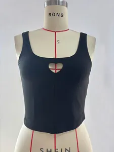 Close-up of the heart-shaped cutout detail on black slim-fit cotton tank top