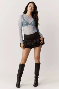 Sheer mesh long-sleeve top with blue heart print and ruffled black mini skirt details