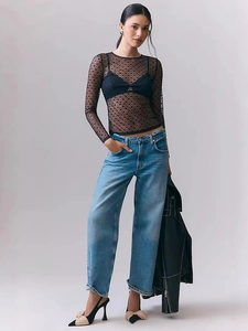 Chic black sheer mesh long sleeve top with heart pattern and elegant slim fit style