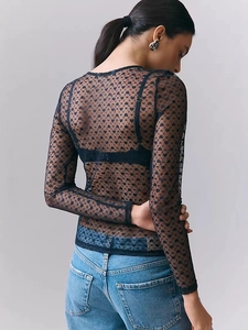 Slim fit black sheer mesh long sleeve top for women featuring delicate heart print patterns