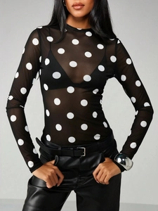 Women's chic black sheer mesh long sleeve top featuring classic white polka dot patterns