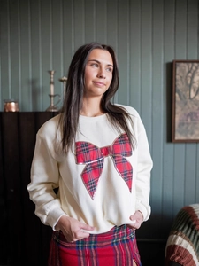 Women's western cream crewneck sweatshirt featuring a large red plaid bow graphic