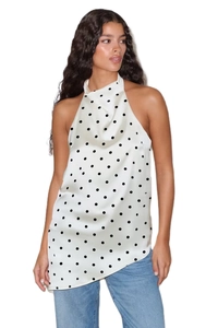 Polka dot halter top detail with shiny satin fabric and irregular hemline design