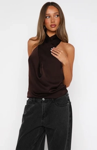 Detail of cross halter neck on coffee satin top with silky sheen fabric texture