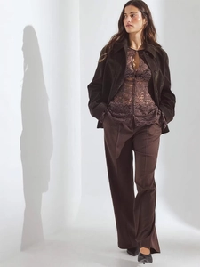 Deep brown three-piece set with sheer lace shirt, work jacket, and straight-leg trousers