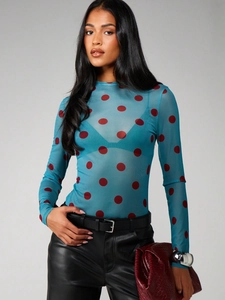 Chic blue sheer mesh long sleeve top with bold red polka dots and slim fit design