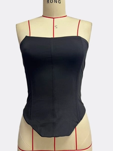 Detail view of black strapless tube top with vertical decorative stitching on mannequin