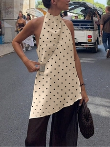 Polka dot halter top with asymmetrical fringe hem and wide-leg trousers set