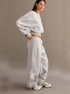 Grey oversized tracksuit with white star patches and drawstring waist casual joggers