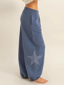 Blue star patch loose jogger pants with drawstring waist and elastic cuffs for women