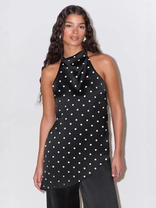 Elegant sleeveless halter neck polka dot blouse in black satin for women's fashion