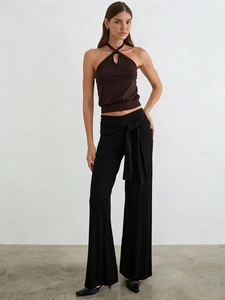 Women's slim fit halter neck top and black high waist wide leg trousers outfit set