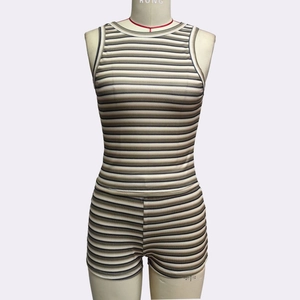 Close-up of the ribbed knit fabric texture on the striped vest and shorts set