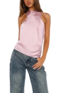 Elegant champagne pink satin halter top paired with vintage blue straight jeans